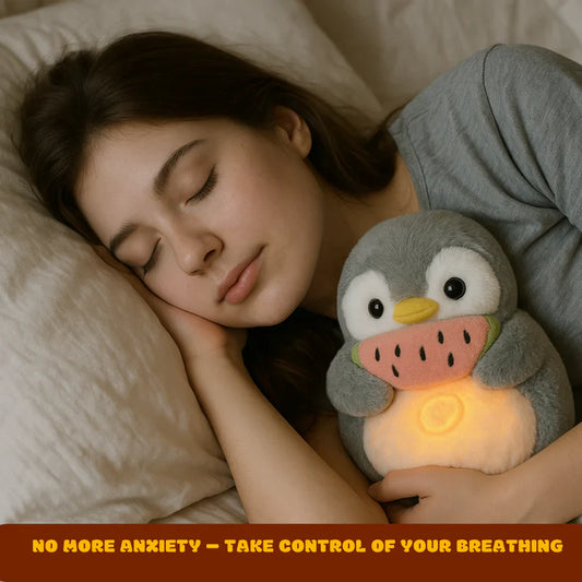 Women Sleeping with the Penguin Breathing Plush