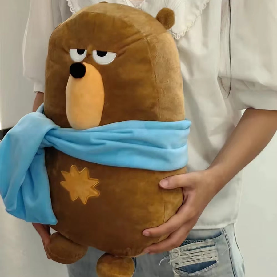 Soft plush fabric texture of the Falstaff Duolingo bear toy