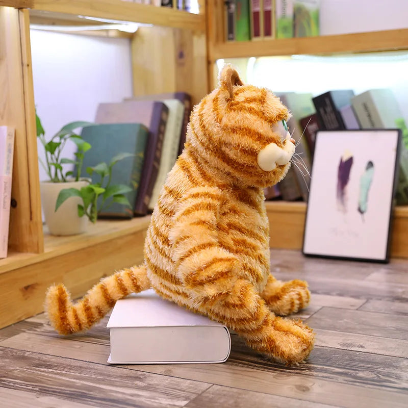 Side view of grumpy Garfield plush stuffed cat