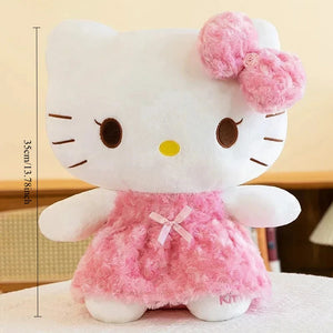 Plush toy resembling a character with a pink bow and dress on a light background