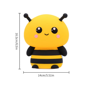 Rechargeable bee night light glowing gently in a dark bedroom