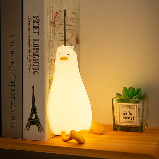 Adorable duck night light made from soft silicone glowing gently