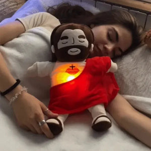 Breathing Jesus plush used as a comforting sleep companion