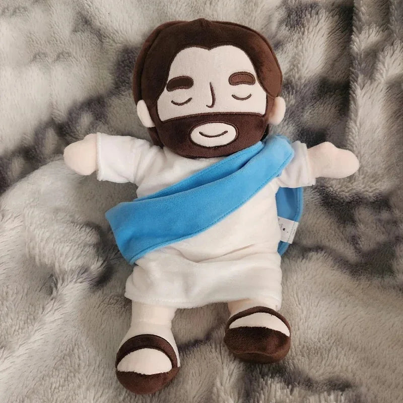 Breathing Jesus plush glowing softly in a dark room