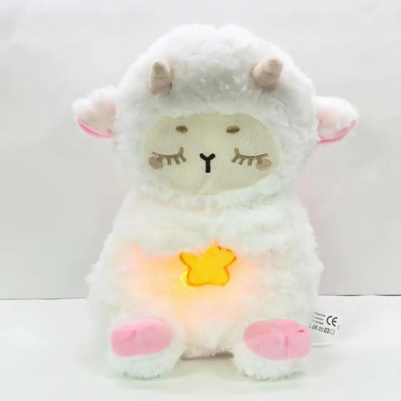 Breathing sheep plush used as a soothing sleep companion at night