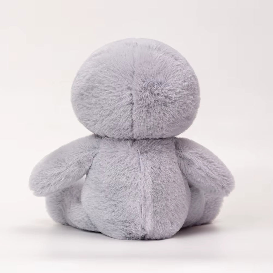 Back view of breathing sloth plush toy showing soft fabric and full design, calming stuffed animal made for kids comfort and sleep support