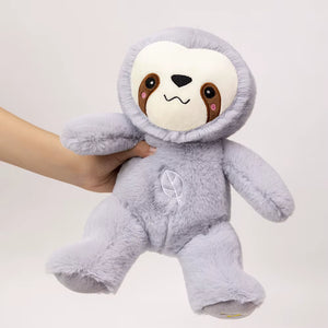 Breathing sloth plush toy held in hand showing size and softness, calming sleep companion for kids and anxiety relief