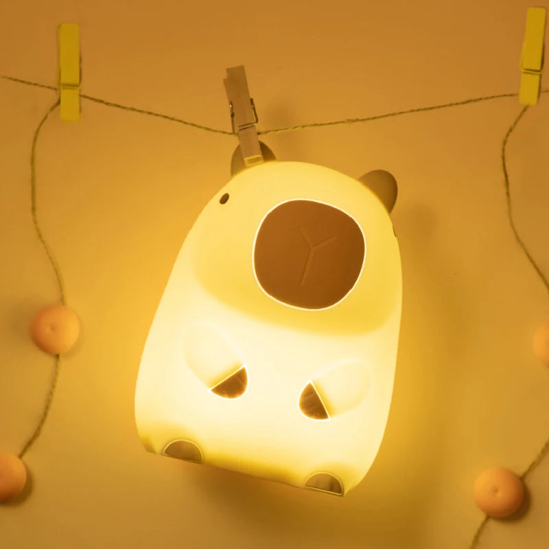 Cute capybara night light placed in a baby nursery