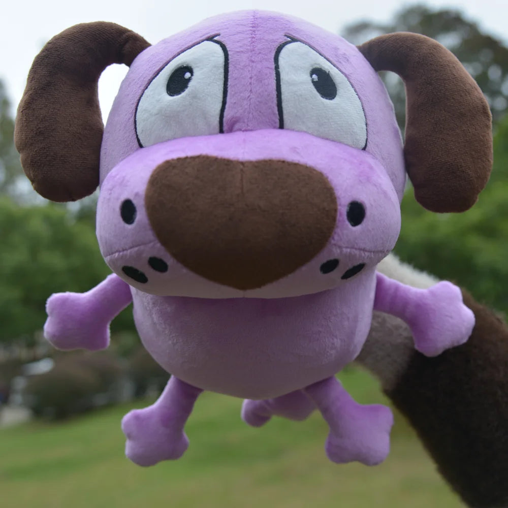 Close-up of the expressive face on a cowardly purple dog plush