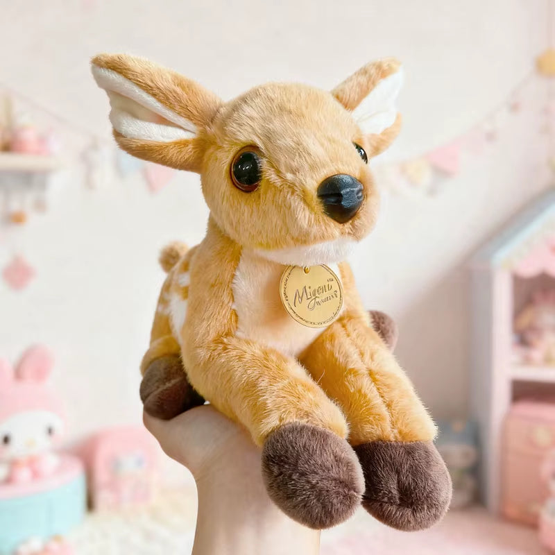 Cute baby deer plush toy held in hand showing size and softness, fawn stuffed animal perfect for kids, cuddling, and gift ideas
