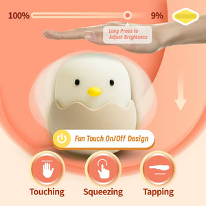 Hand touching the duck night light to adjust brightness