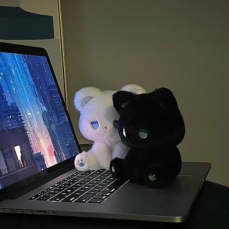 Close-up of the soft fabric texture of the emo cat plush