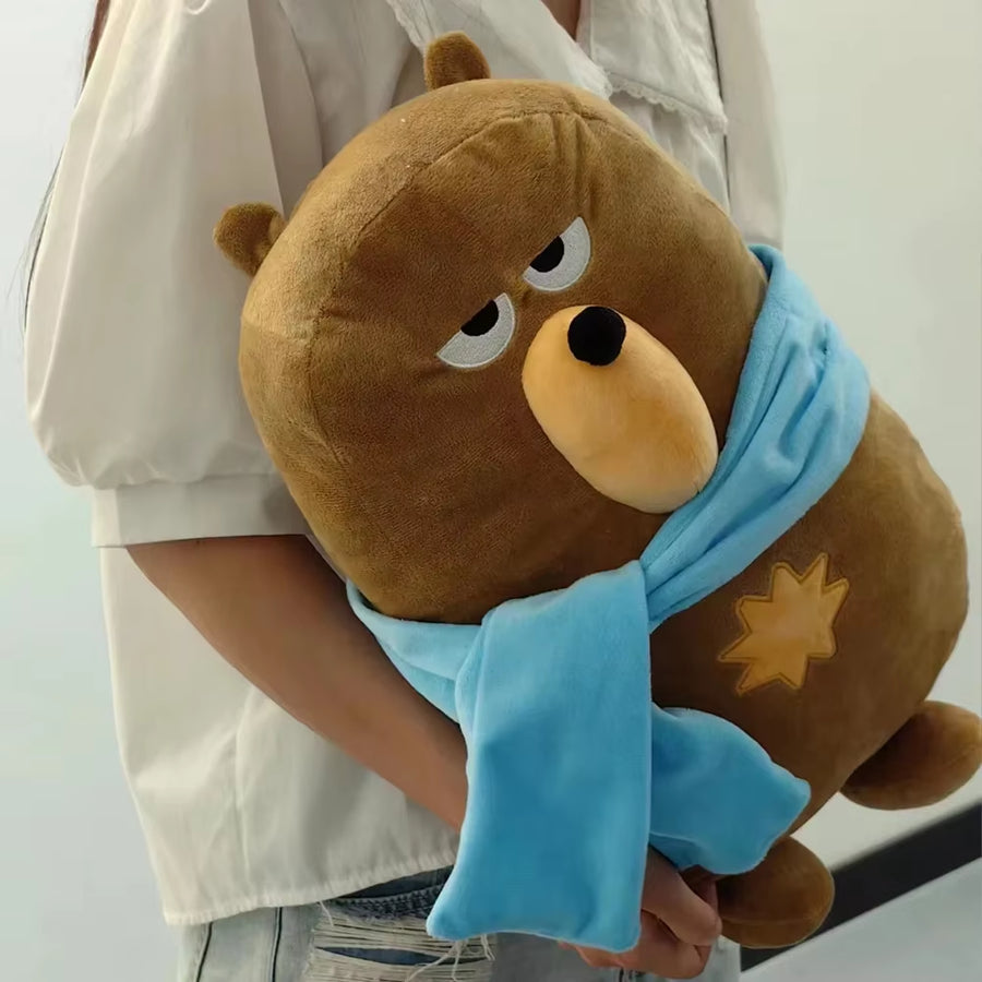 Side view of Falstaff Duolingo plush bear showing soft design