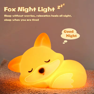 Fox night light glowing softly in a dark room
