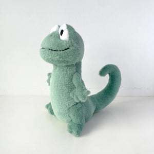 green lizard plush toy back side view soft stuffed animal on white background