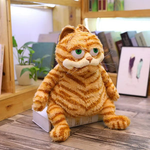 Front view of grumpy Garfield plush lazy cat toy