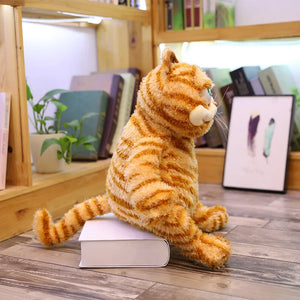 Side view of grumpy Garfield plush stuffed cat