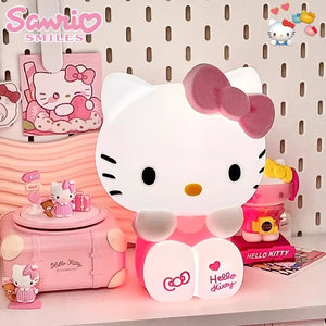 Cute kitty night light glowing softly in a dark room