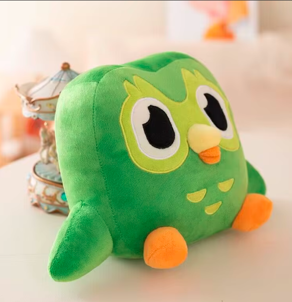 Close-up of the cute face on the kawaii owl plush