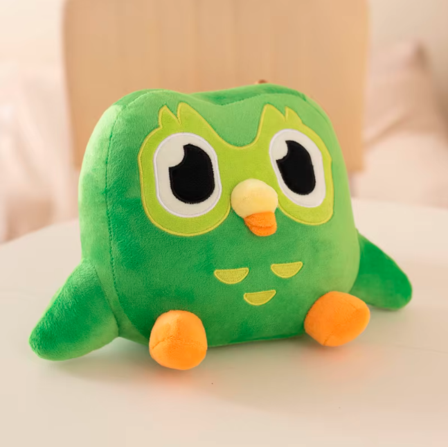 Kawaii owl plush toy presented as a gift for kids and anime fans
