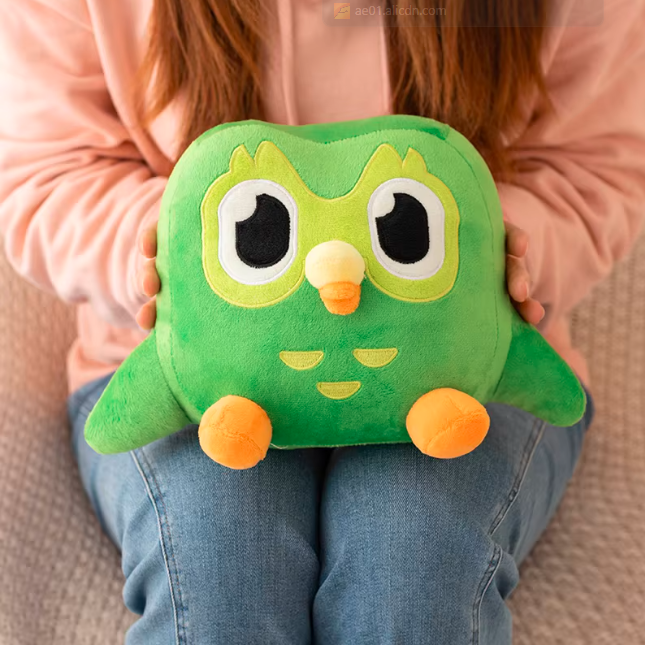 Child hugging a kawaii owl plush toy