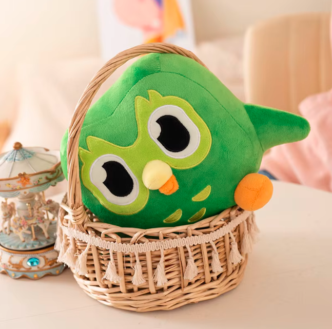 Kawaii owl plush toy placed in a cozy kids bedroom