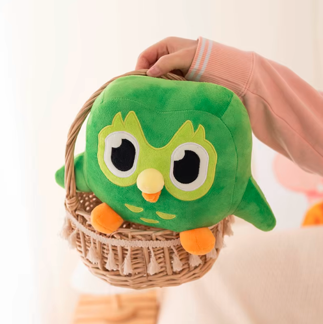 Side view of kawaii owl plush stuffed toy