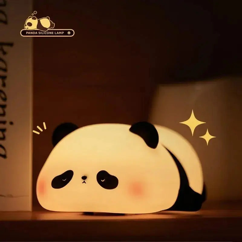 Panda night light glowing softly in a dark bedroom