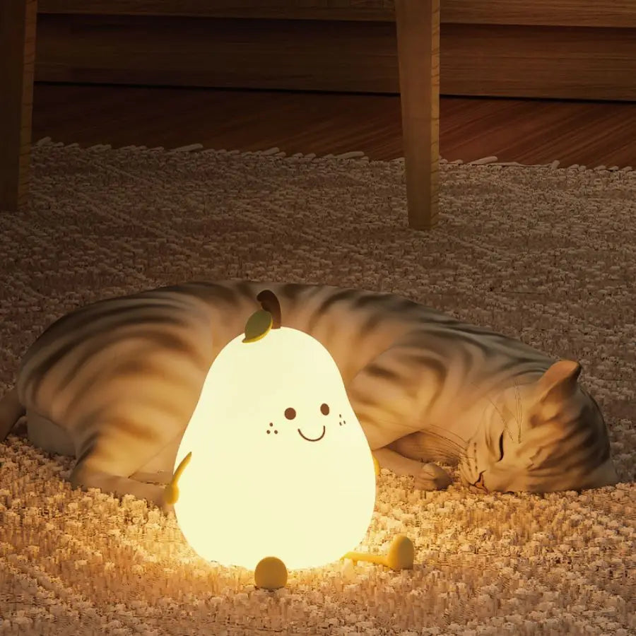 Cute pear night light placed in a baby nursery