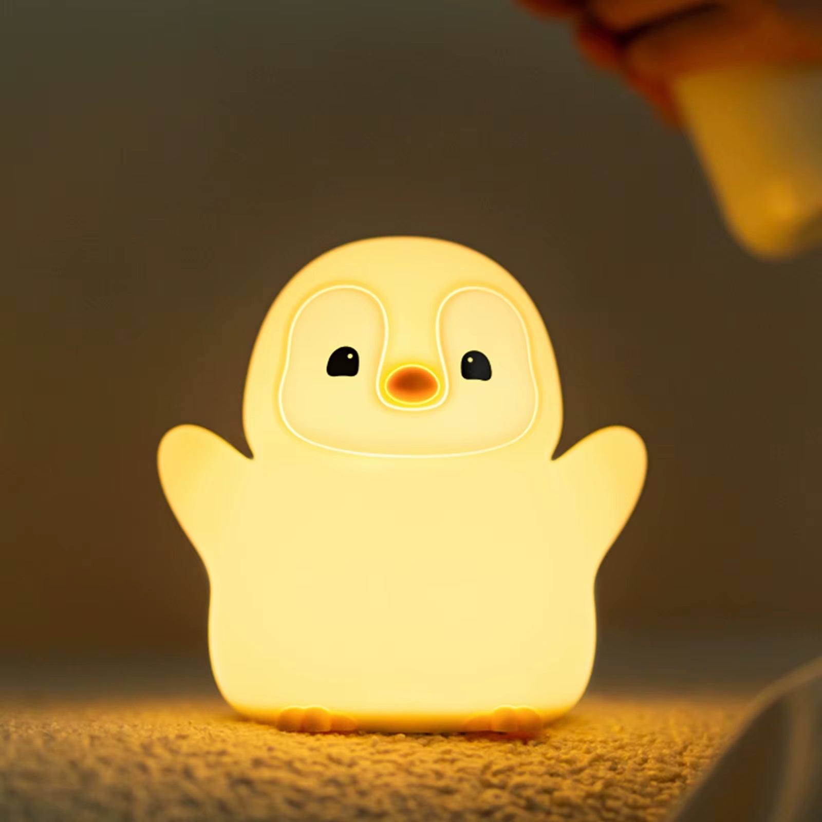 Soft silicone material of the penguin night light shown in detail