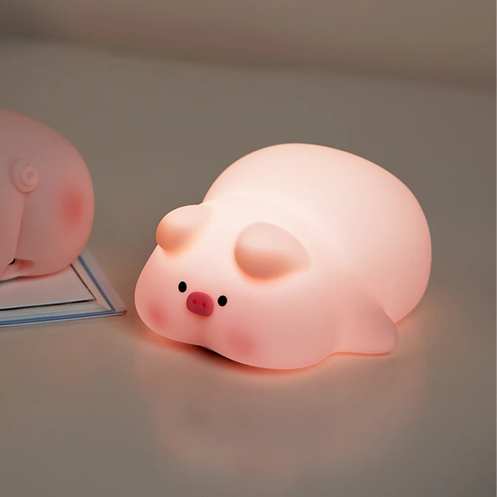 Pink pig night light used in a bedroom for gentle nighttime lighting