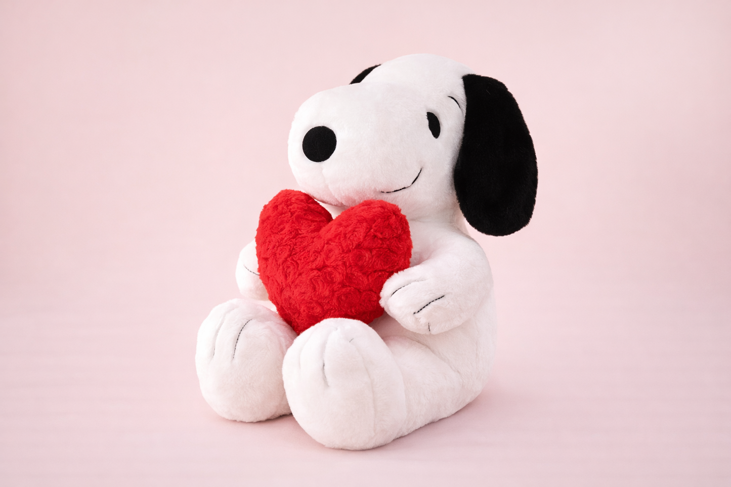 SoftSnoopy plush dog holding red heart, romantic stuffed animal gift on pastel background