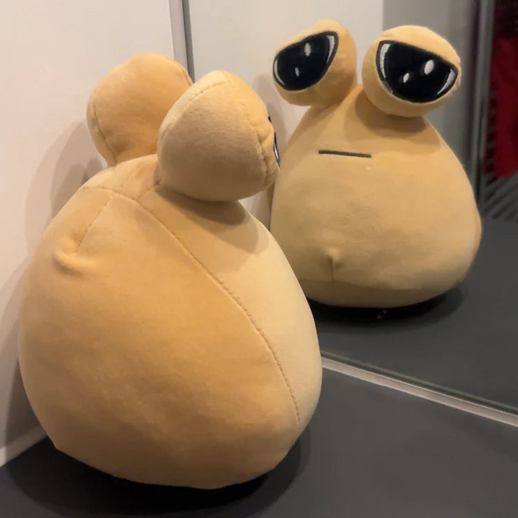 Pou plush toy shown from back and front in mirror, soft stuffed toy with simple cute design for kids