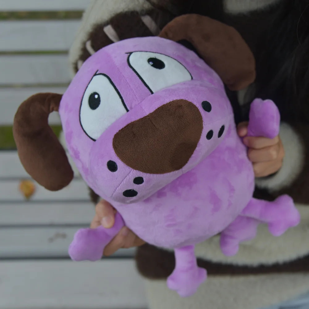Front view of the cowardly purple dog plush with a gentle expression