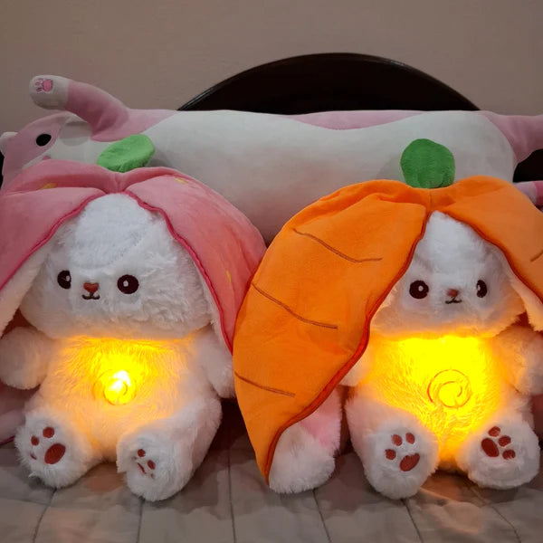 Strawberry and carrot radish bunny breathing plush toys displayed together