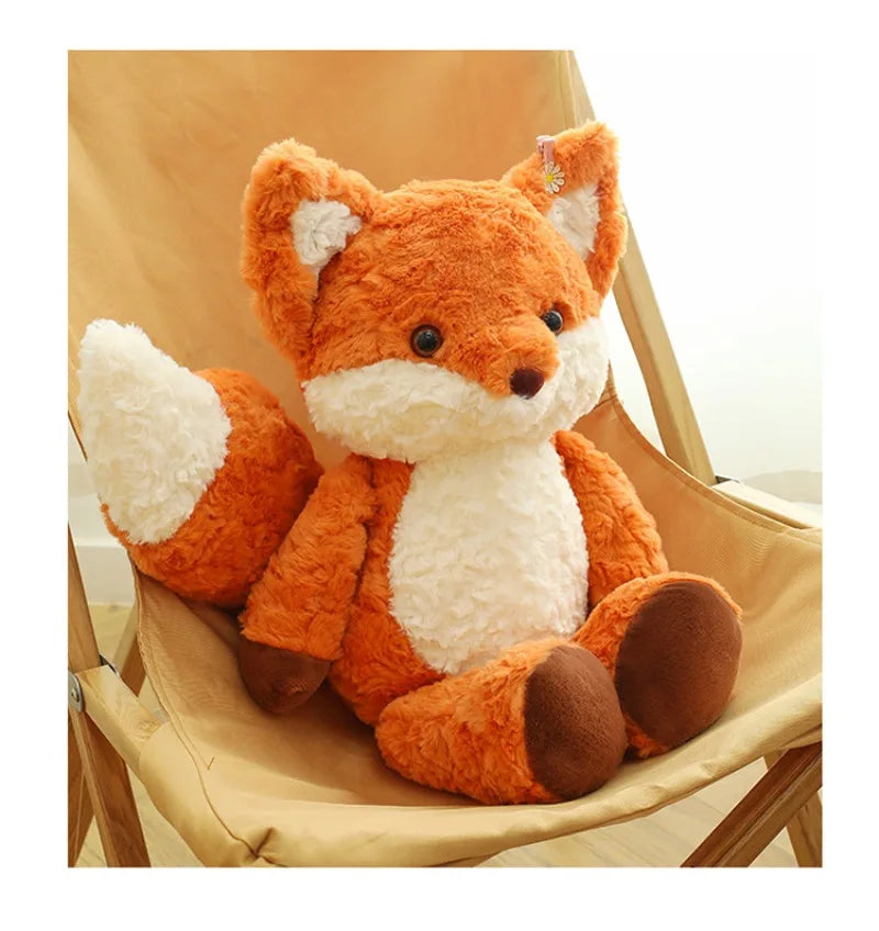 Red fox plush toy being hugged to show its soft and comforting feel