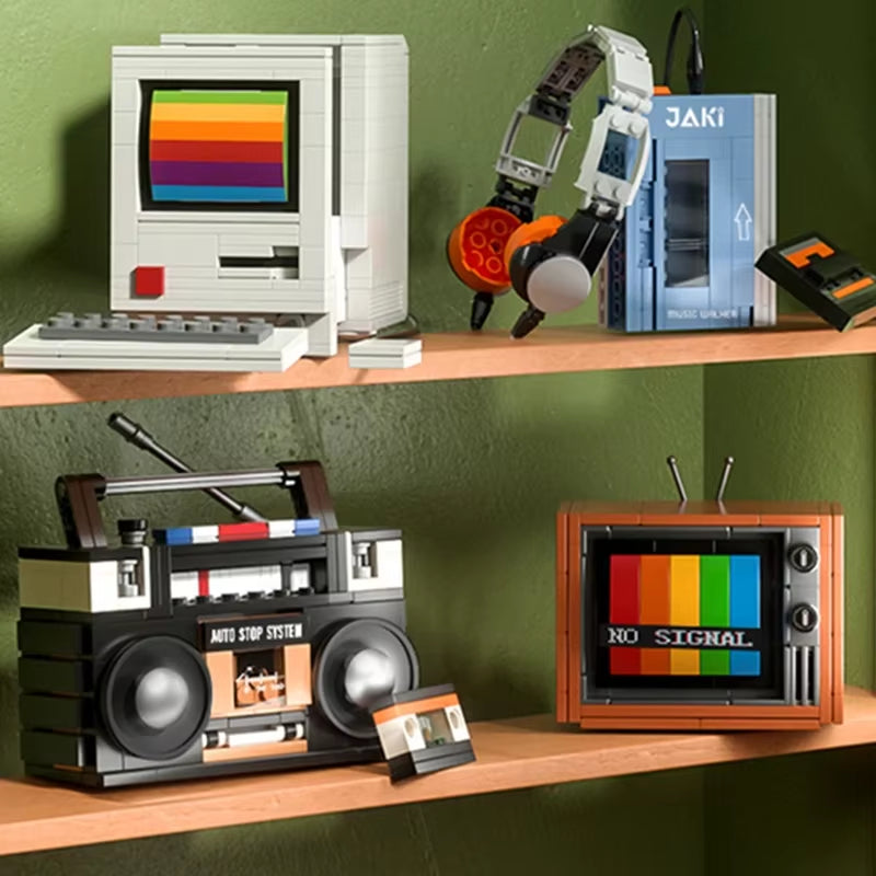 DIY retro electronics building blocks set featuring mini TV, computer, radio, and console models