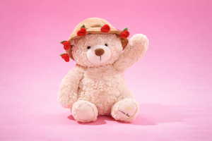 Rose bear plush used as romantic bedroom decor with floral detail