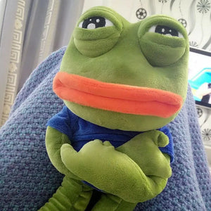 sad pepe frog plush toy close up showing soft texture and detailed face
