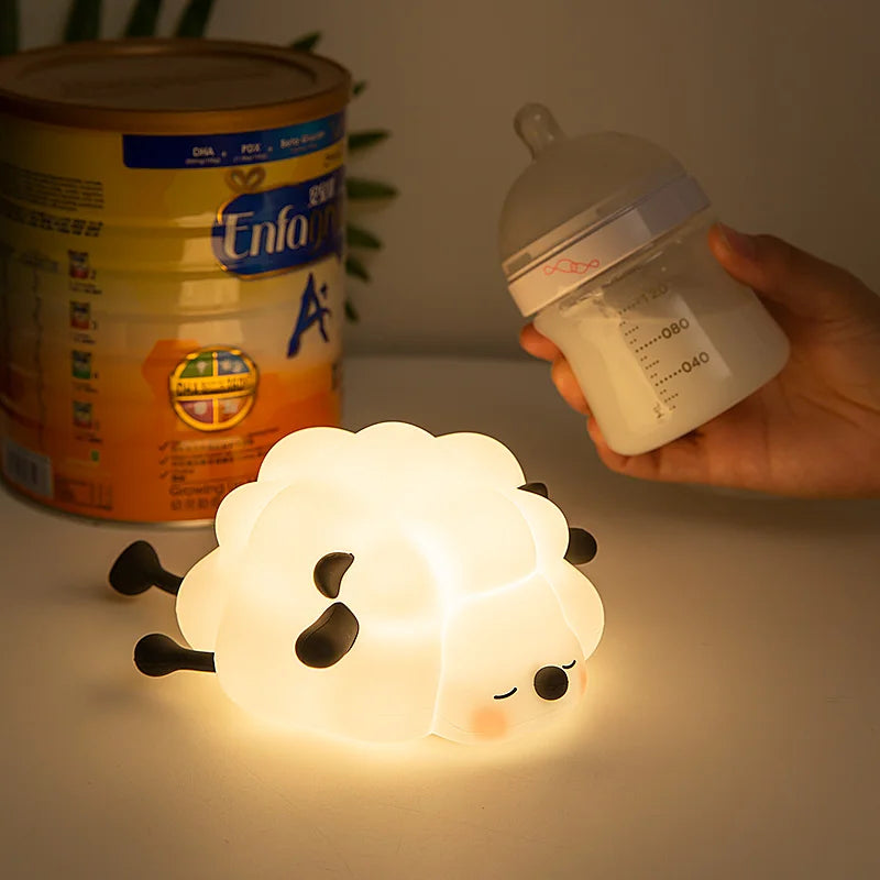 Cute sheep night lamp on a bedside table for nighttime lighting