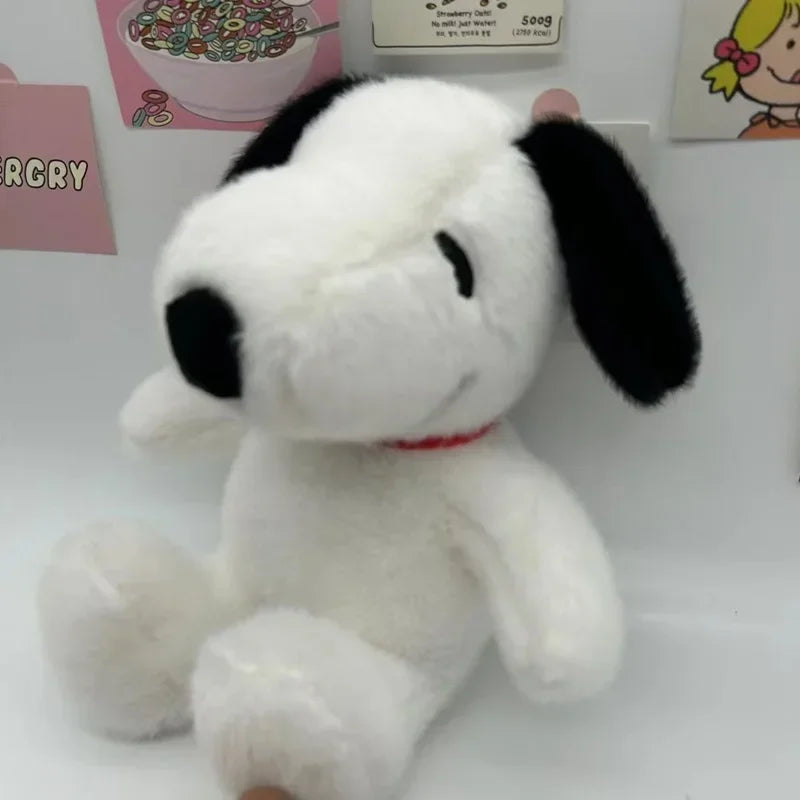 Close-up of the Snoopy plush toy showing its soft fabric texture