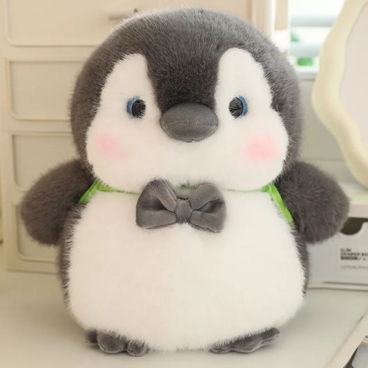 Soft penguin plush couple displayed together in a cozy and loving pose