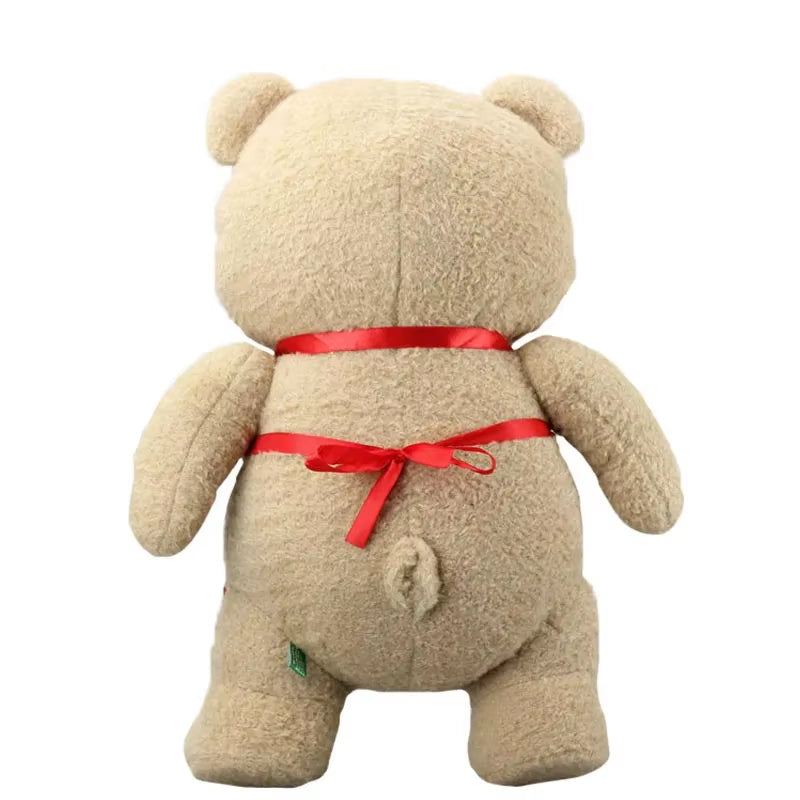 Back view of Ted plush teddy bear wearing a red kitchen apron