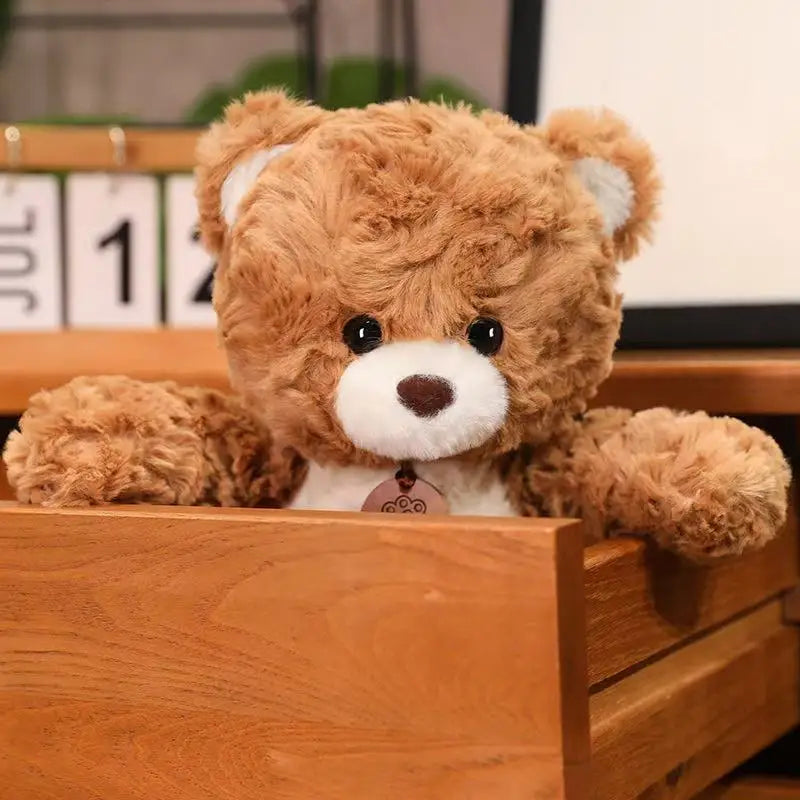 Handmade teddy bear plush with a calm and gentle expression