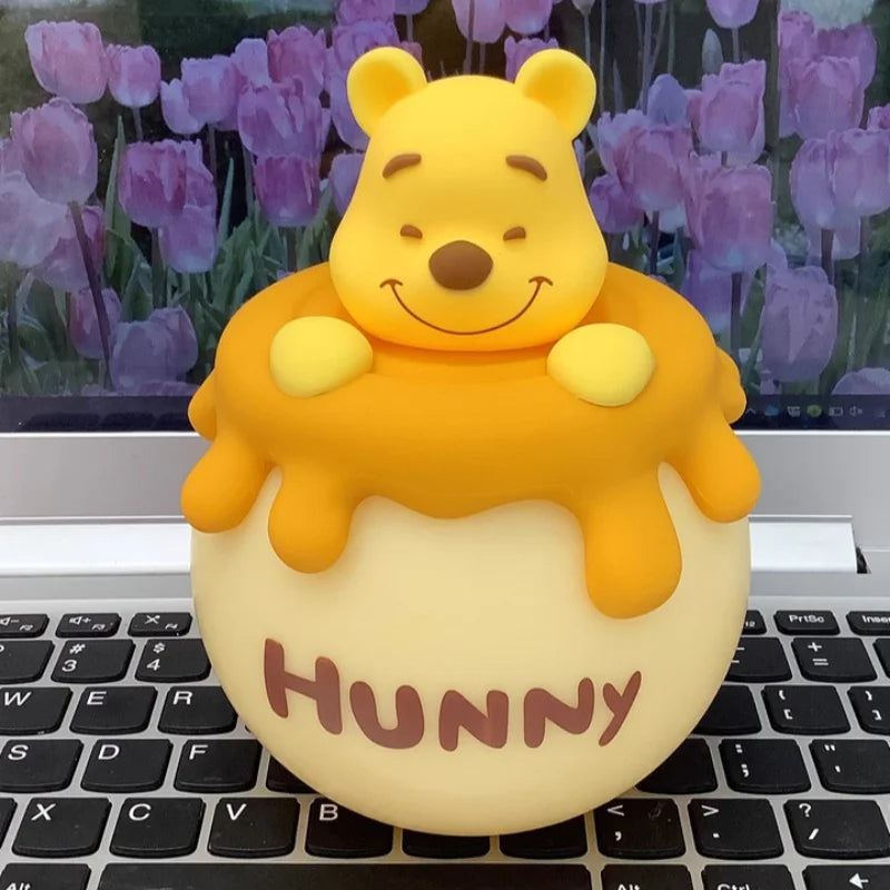 Close-up view of the Winnie the Pooh night light showing its cute design