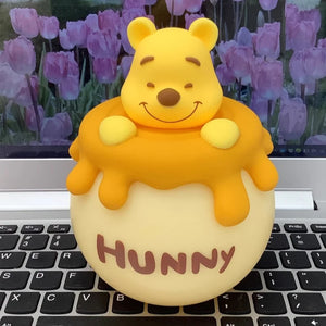 Close-up view of the Winnie the Pooh night light showing its cute design